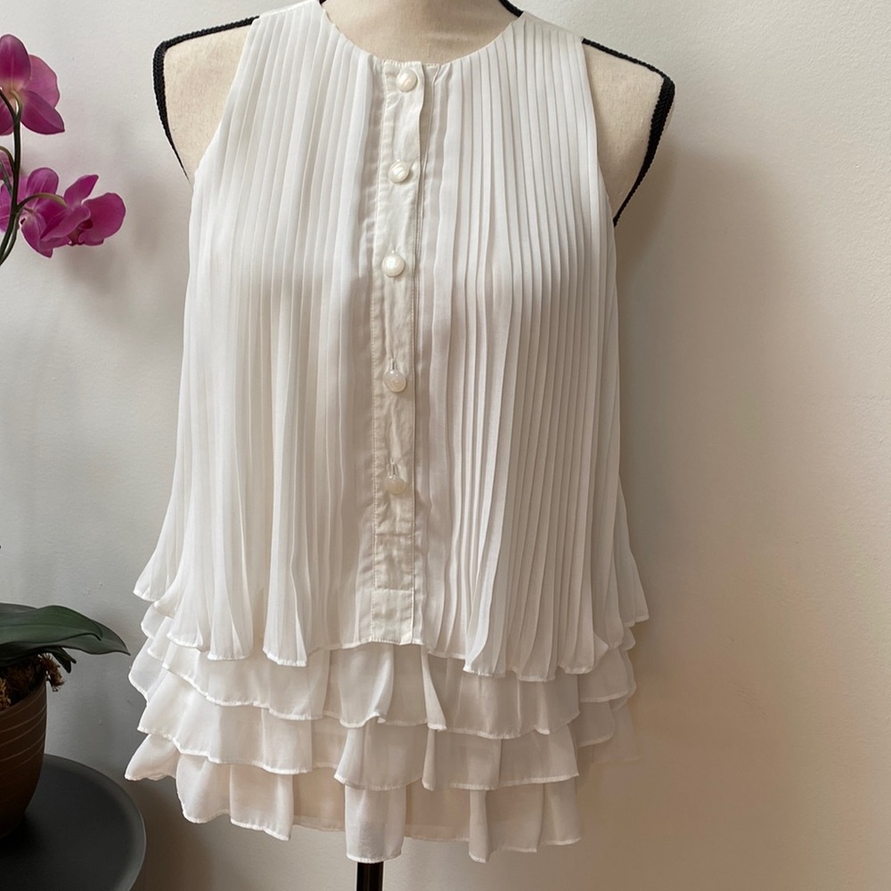 Pleated blouse.  One word - CUTE!